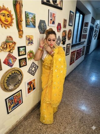 Yellow Jaipuri handcrafted Kacha Gotta Patti organza saree with traditional Rajasthani embroidery by Melegant