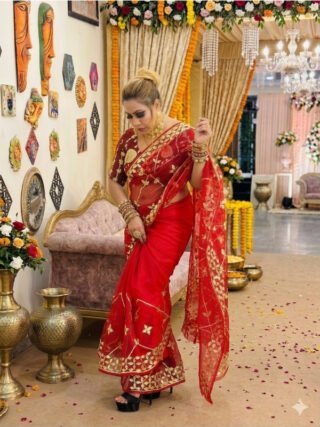 Red Jaipuri handcrafted Kacha Gotta Patti organza saree with golden traditional embroidery for wedding wear by Melegant