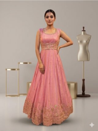 Luxury blush pink silk flared gown with hand bead and zari embroidered designer koti for women, ideal for weddings, receptions, engagements, festive celebrations, and designer ethnic wear by Melegant.